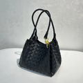 Dense Grid Woven Sloped Tote With Braided Twisted Top Handles, Knotted Golden Central Clasp And Extra Single Hanging Strap